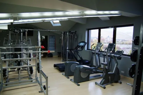 Salle de musculation chez l'hébergeur